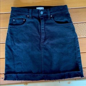 Black denim mini skirt